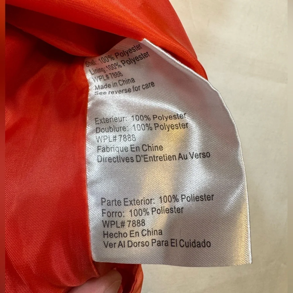 NWOT Michael Kor’s Women's Orange Hooded Rain Coat Jacket with silver details